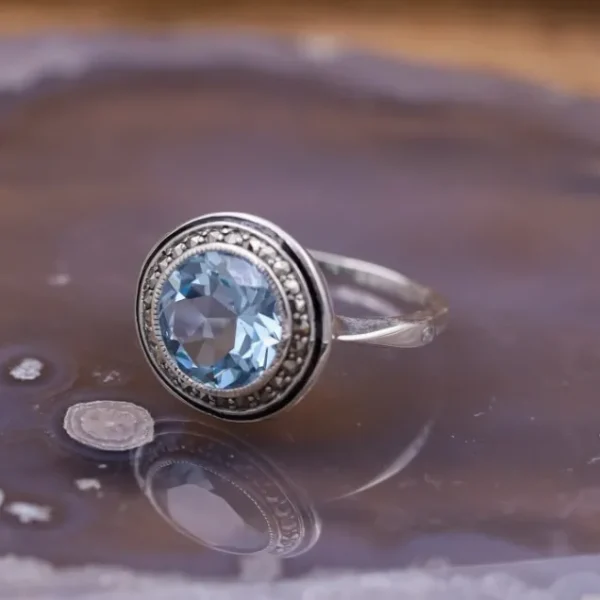 Colimaçon Bagues D'exception-Bague d'exception en argent, émail noir, marcassites et Topaze Bleue